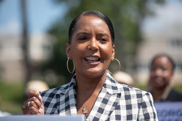 Former Atlanta mayor and Democratic nominee for governor Keisha Lance Bottoms campaigns outside of a shuttered rural hospital in Commerce, Georgia on June 17, 2026. (Riley Bunch/AJC)