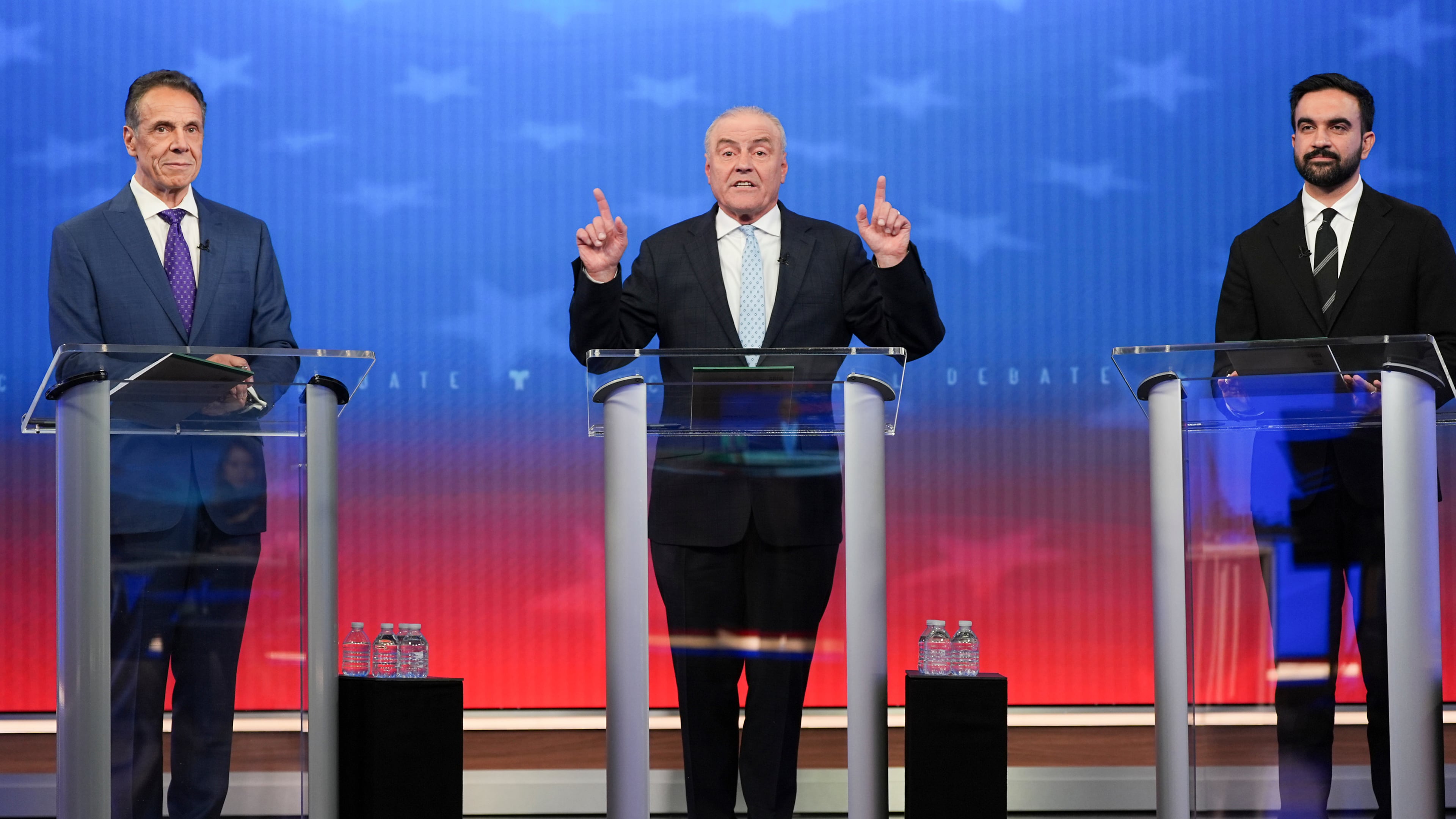 Republican candidate Curtis Sliwa, center, speaks during a mayoral debate with independent candidate former New York Gov. Andrew Cuomo, left, and Democratic candidate Zohran Mamdani, Thursday, Oct. 16, 2025, in New York. (AP Photo/Angelina Katsanis, Pool)