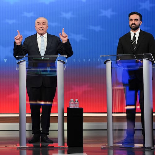 Republican candidate Curtis Sliwa, center, speaks during a mayoral debate with independent candidate former New York Gov. Andrew Cuomo, left, and Democratic candidate Zohran Mamdani, Thursday, Oct. 16, 2025, in New York. (AP Photo/Angelina Katsanis, Pool)