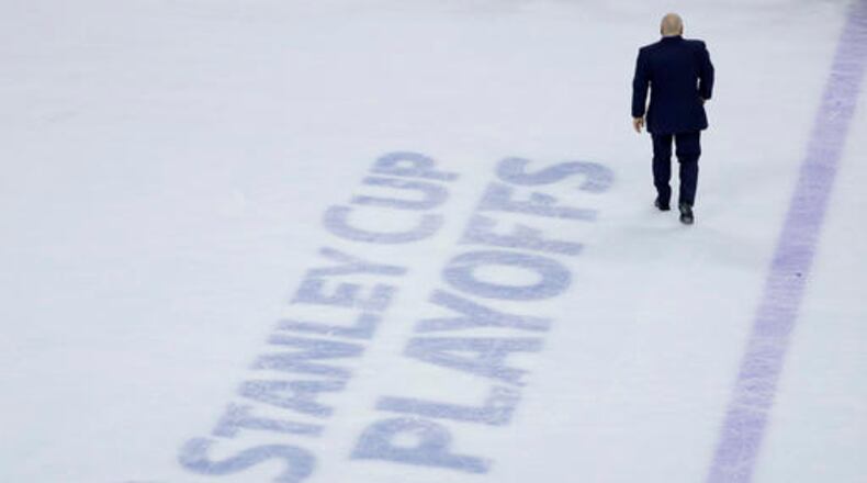 Washington Capitals head coach Barry Trotz walks off the ice after winning Game 6 in the first round of the NHL Stanley Cup hockey playoffs against the Philadelphia Flyers, 1-0, Sunday, April 24, 2016, in Philadelphia. Washington won the series 4-2. (AP Photo/Matt Slocum)