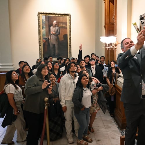 State Sen. Drew Echols (right) takes a selfie with Latino students and children as they visit the Georgia state Capitol in 2025. Latinos are 16% of Georgia’s K-12 students. (Hyosub Shin/AJC)