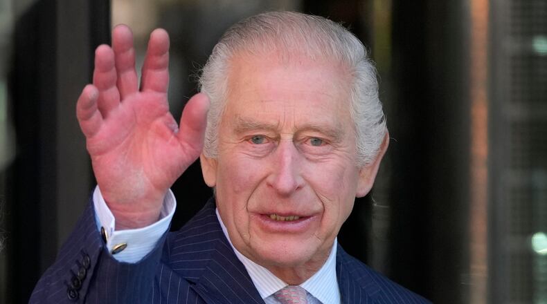 FILE -Britain's King Charles III waves as he arrives for a visit to University College Hospital Macmillan Cancer Centre in London, Tuesday, April 30, 2024. (AP Photo/Kin Cheung, File)