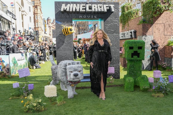 Jennifer Coolidge poses for photographers upon arrival at the World premiere of A Minecraft Movie on Sunday, March 30, 2025, in London. (Photo by Scott A Garfitt/Invision/AP)