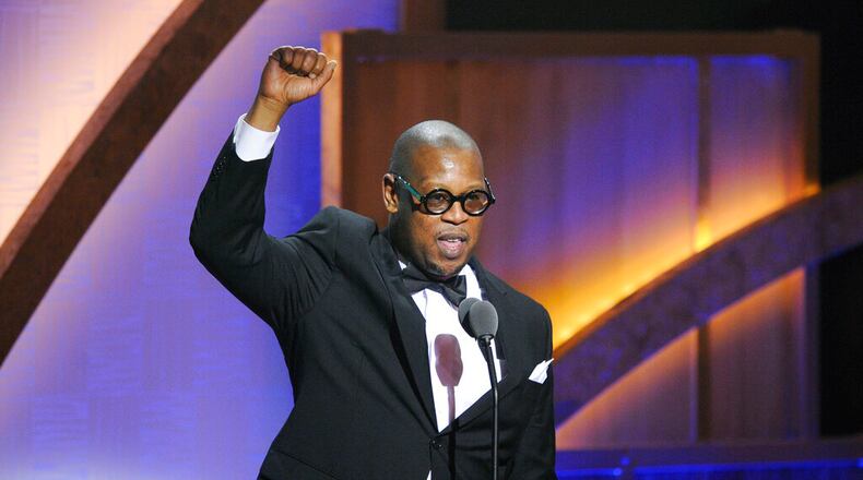 FILE - In this Jan. 16, 2010 file photo, media executive Andre Harrell speaks during the 2010 BET Hip Hop Honors in Washington. Harrell, the Uptown Records founder who shaped the sound of hip-hop and R&B in the late ‘80s and’90s with acts like Mary J. Blige and Heavy D and also launched the career of mogul Sean “Diddy” Combs, has died, several members of the music community revealed late Friday, May 8, 2020. He was 59. (AP Photo/Nick Wass)