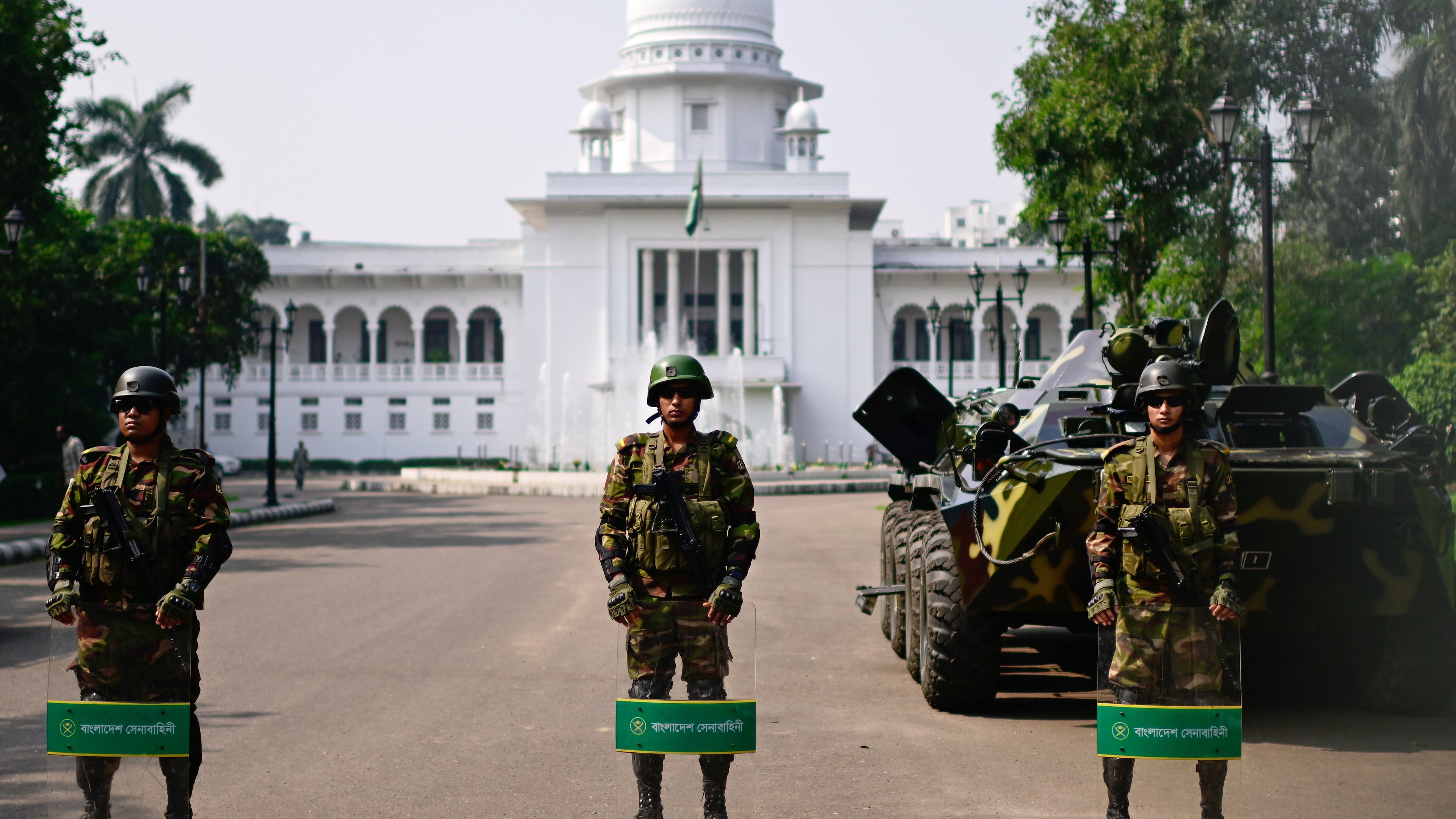 Security personnel stand guard at Bangladesh's Supreme Court as ousted Prime Minister Sheikh Hasina and her former ruling Awami League party called for a nationwide "lockdown" in protest against her trial in Dhaka, Bangladesh, Thursday, Nov. 13, 2025. (AP Photo/Mahmud Hossain Opu)