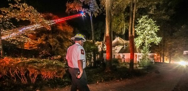 The chimney of a 7,000-square-foot home on Powers Ferry Road collapsed into the second floor, forcing firefighters into a defensive position on the home's exterior. No one was injured, according to Sandy Springs fire.