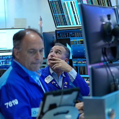 Christopher Lagana works on the floor at the New York Stock Exchange in New York, Monday, Sept. 14, 2026. (AP Photo/Seth Wenig)