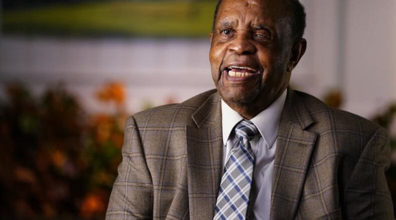 Lee Elder conducts an interview at Augusta National Golf Club, Monday, Nov. 9, 2020.