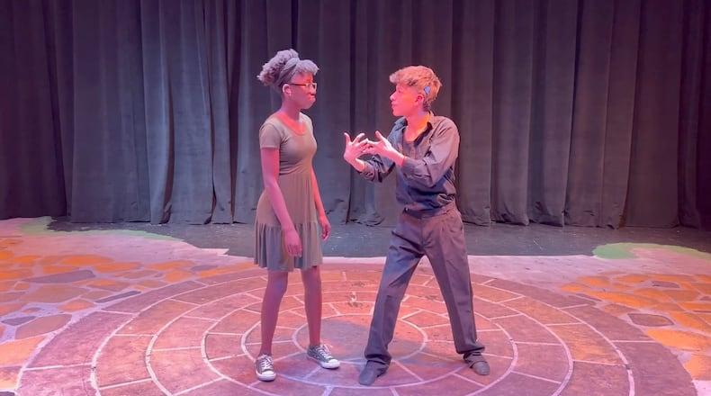 Central Gwinnett students Titilayo Odupolu (left) and Josue Martinez took top honors in the American Sign Language Artistic Expression competition that is part of the National Deaf High School Theatre Festival.