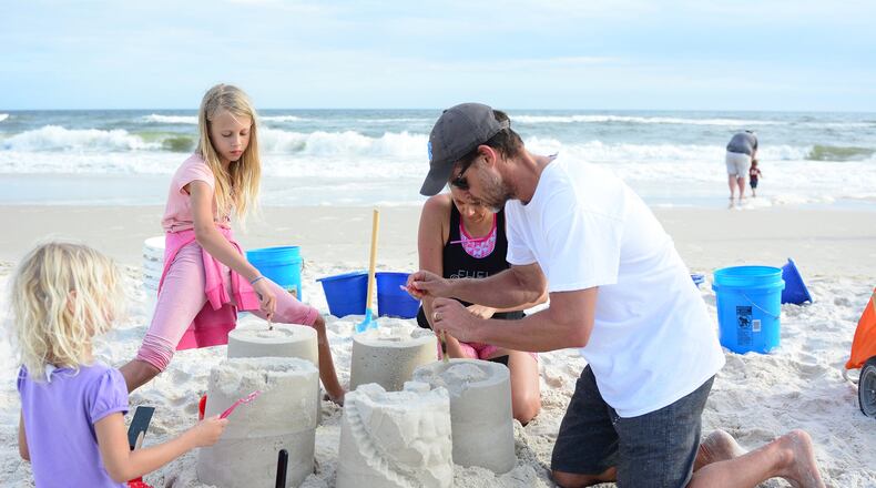 Go beyond the basic pail-and-shovel creation by signing up the whole family for a course at Sand Castle University. Contributed by Gulf Shores & Orange Beach Tourism