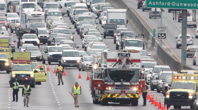 All westbound lanes of I-285 in Sandy Springs were shut down at Roswell Road early Jan. 22, 2015 due to a fatal pedestrian accident. JOHN SPINK / JSPINK@AJC.COM All westbound lanes of I-285 in Sandy Springs were shut down at Roswell Road early Jan. 22, 2015 due to a fatal pedestrian accident. JOHN SPINK / JSPINK@AJC.COM