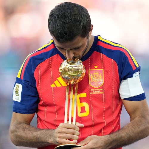 Spain's Rodri poses with the tournament's best player award at the end of the World Cup final soccer match between Spain and Argentina in East Rutherford, N.J., near New York, Sunday, July 19, 2026. (AP Photo/Ashley Landis)