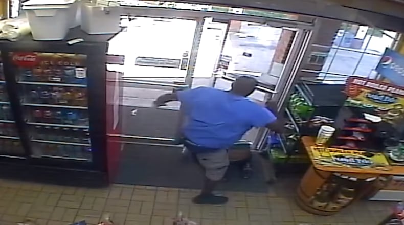 A man was arrested after he allegedly attacked two people in Duluth on Tuesday, police said.