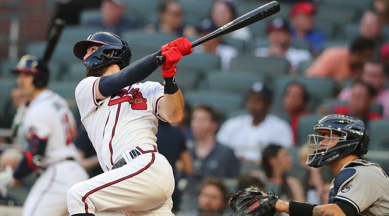 Braves shortstop Dansby Swanson follows through on his solo home run which tied the game at 1 in the bottom of the second inning Monday, Aug. 24, 2021, against the New York Yankees at Truist Park in Atlanta. (Curtis Compton/Curtis.Compton@ajc.com)