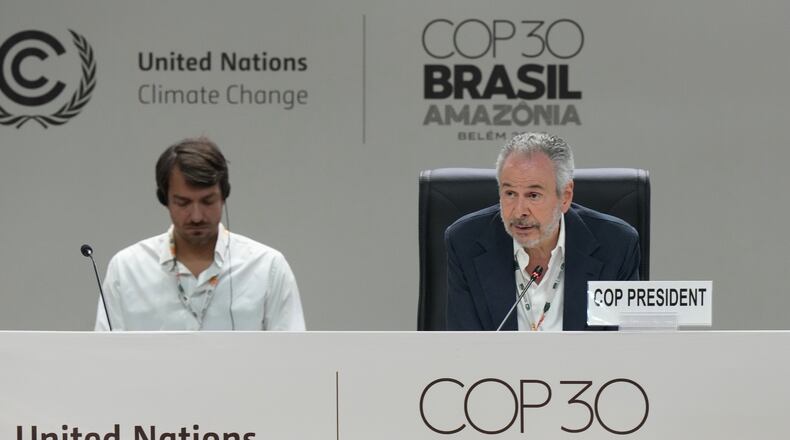 André Corrêa do Lago, COP30 president, right, speaks during a plenary session at the COP30 U.N. Climate Summit, Friday, Nov. 21, 2025, in Belem, Brazil. (AP Photo/Fernando Llano)
