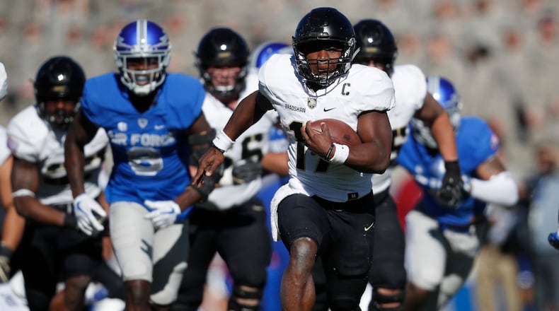Army quarterback Ahmad Bradshaw, 10th in the FBS in rushing, breaks a long one against Air Force this season. (AP Photo/David Zalubowski, File)