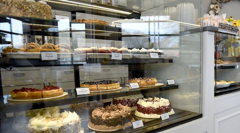 The bakery case at Bread & Butter Bakery at Marietta Square Market has plenty of ways to tempt you. RYON HORNE/RHORNE@AJC.COM