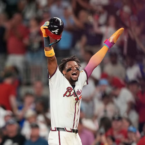 Atlanta Braves' Ronald Acuña Jr. (13) celebrates a win after the 10th inning of a baseball game against the New York Mets Tuesday, June 17, 2025, in Atlanta. (AP Photo/Brynn Anderson)
