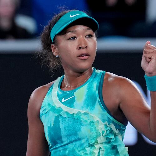 Naomi Osaka of Japan reacts after defeating Sorana Cirstea of Romania in their second round match at the Australian Open tennis championship in Melbourne, Australia, Thursday, Jan. 22, 2026. (AP Photo/Dita Alangkara)