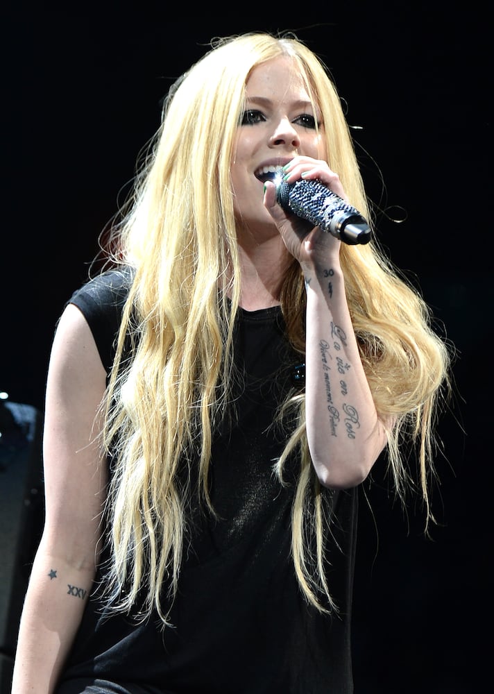 Avril Lavigne is addicted to eyeliner. She says she feels naked without it on and would rather have too much than too little.