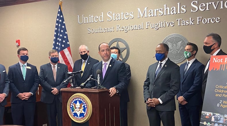 Georgia Attorney General Chris Carr speaks to reporters Thursday. A recent operation led by the U.S. Marshals Service resulted in the recovery of 39 missing children, including 15 who were the victims of sex trafficking, officials said.