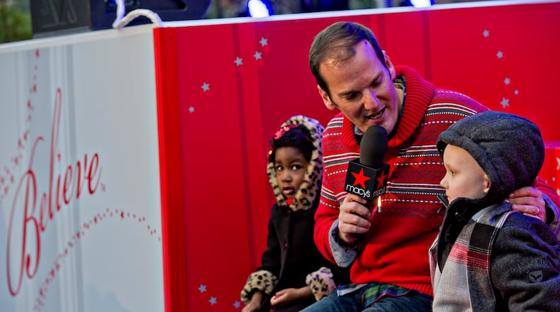 November 27, 2014 Atlanta - Emcee Cadillac Jack (center) interviews Carson Sims (right) and McKinley Parks during the annual Macy's Great Tree Lighting celebration at Lenox Square Mall in Atlanta on Thursday, November 27, 2014. Thousands of people came out to watch the show which featured performances by The Isley Brothers, Pentatonix, tenor Timothy Miller and many more. JONATHAN PHILLIPS / SPECIAL