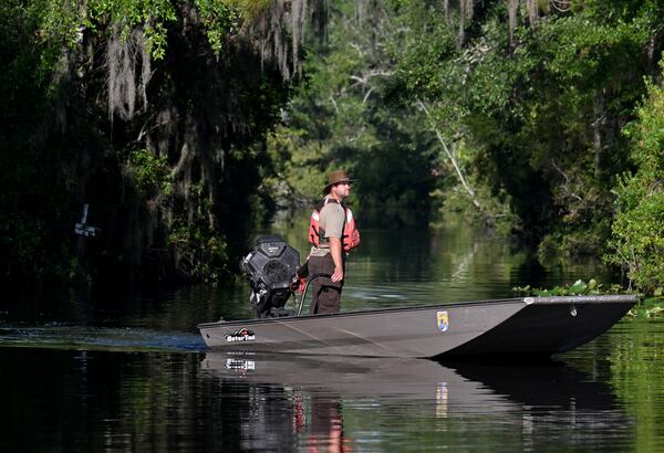 Zach Carter cruises down the Suwannee Canal at the Okefenokee National Wildlife Refuge on Tuesday, Aug. 12, 2025. (Hyosub Shin/AJC)