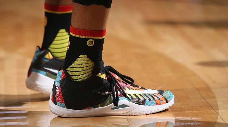 A detail of the shoes worn by Hawks' Mike Scott against the  Nuggets Jan. 25, 2016, at the Pepsi Center in Denver.