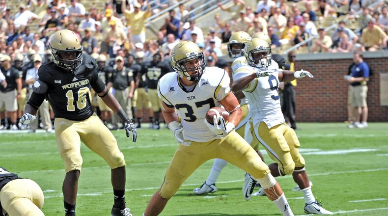 Georgia Tech Yellow Jackets running back Zach Laskey (37) scores a touchdown against the Wofford Terriers in the first half of the Georgia Tech season opener at Bobby Dodd Stadium on Saturday, August 30, 2014. HYOSUB SHIN / HSHIN@AJC.COM