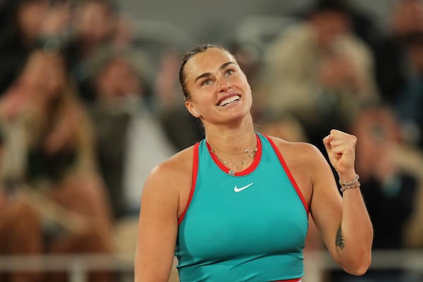 Aryna Sabalenka of Belarus celebrates as she won the semifinal match of the French Tennis Open against Poland's Iga Swiatek at the Roland-Garros stadium in Paris, Thursday, June 5, 2025. (AP Photo/Thibault Camus)