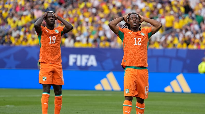 Ivory Coast's Elye Wahi, right, and teammate Nicolas Pepe react after missing a chance to score against Ecuador during a World Cup Group E soccer match in Philadelphia, Sunday, June 14, 2026. (AP Photo/Matt Slocum)