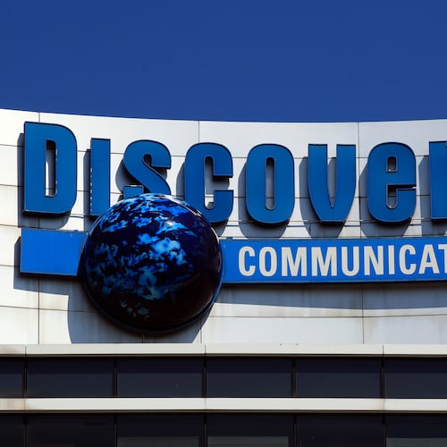 FILE - The Discovery Communications logo atop its headquarters in Silver Spring, Md, July 31, 2017. (AP Photo/Manuel Balce Ceneta, File)