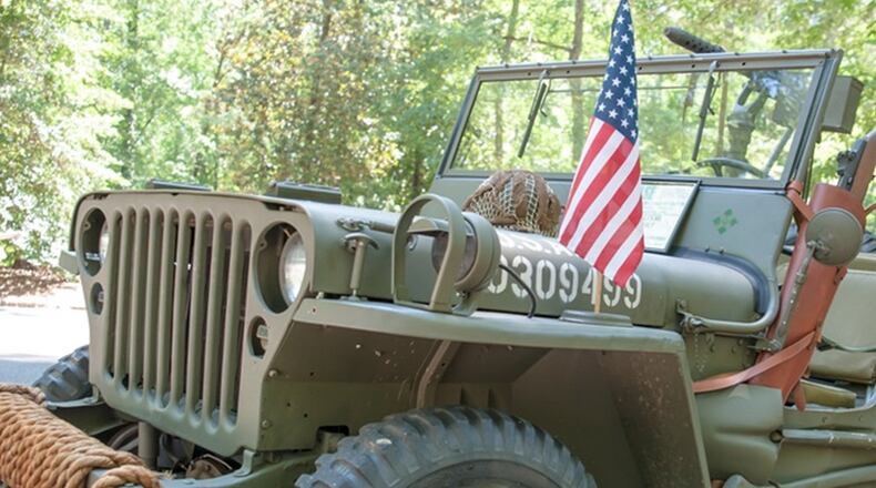 Georgia Veterans Day Parade. 11:11 a.m. Saturday. Begins on Peachtree Street south of Ralph McGill / Ivan Allen Boulevard and ends at Centennial Olympic Park Drive and Marietta Street. The parade’s reviewing stand will be on Baker Street between the World of Coca Cola and Georgia Aquarium, where parking will be available along with other paid lots. Grand Marshal will be General George W. Casey Jr., U.S. Army (retired), now a lecturer on leadership. GaVetsDayParade.org. Courtesy of Atlanta History Center