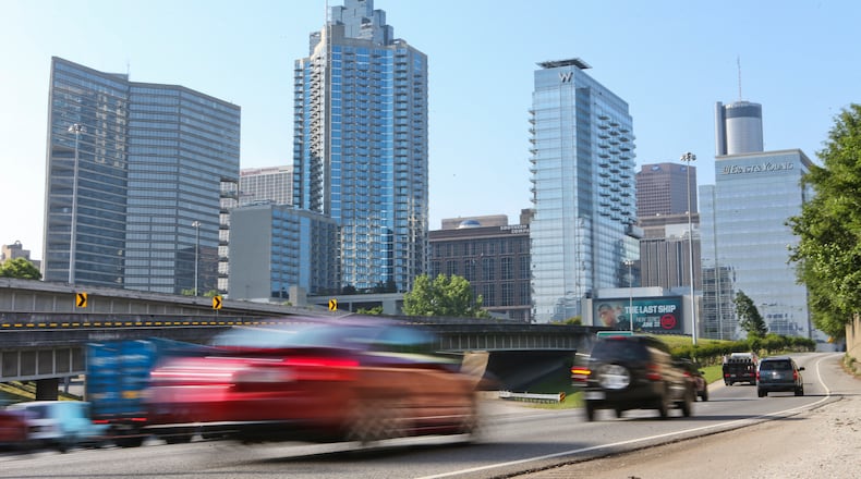 Motorists drive on the I-75/85 Downtown Connector in Atlanta, Ga. Friday, May 23, 2014. JOHN SPINK / AJC