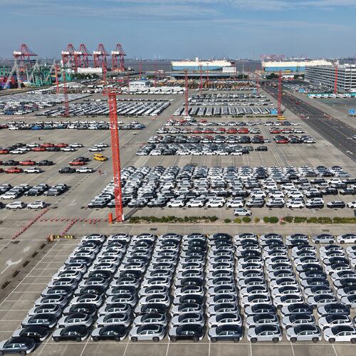 Aerial view of new cars waiting for shipment at a port in Shanghai, China, Wednesday, Jan. 14, 2026. (Chinatopix Via AP)