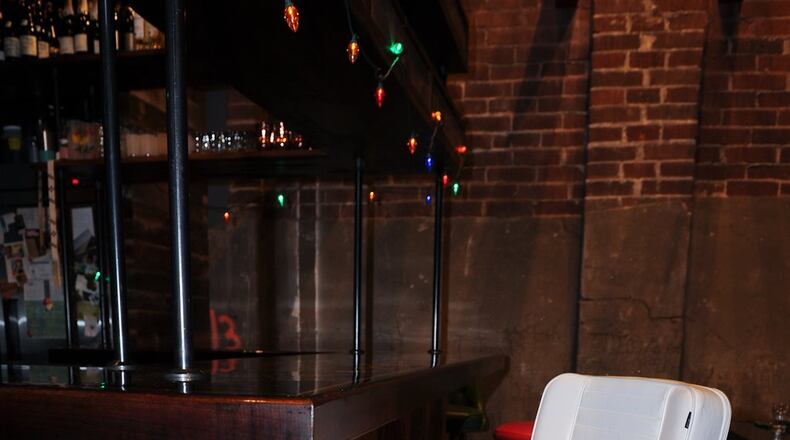 The Captain’s Chair is located at the end of the bar at Ticonderoga Club in Krog Street Market. (BECKY STEIN PHOTOGRAPHY)