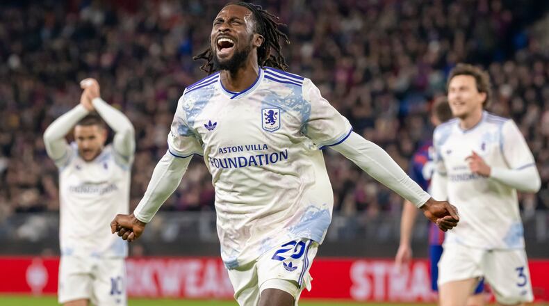 Villa's Eyann Guessand, front, celebrates after scoring the opening goal during the Europa League opening phase soccer match between FC Basel 1893 and Aston Villa in Basel, Switzerland, Thursday, Dec. 11, 2025. (Georgios Kefalas/Keystone via AP)