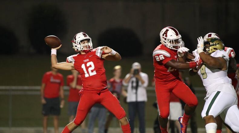 Archer quarterback Carter Peevy (12) attempts a pass in the first half against Grayson at Archer High School Friday, October 13, 2017, in Lawrenceville, Ga.. PHOTO / JASON GETZ