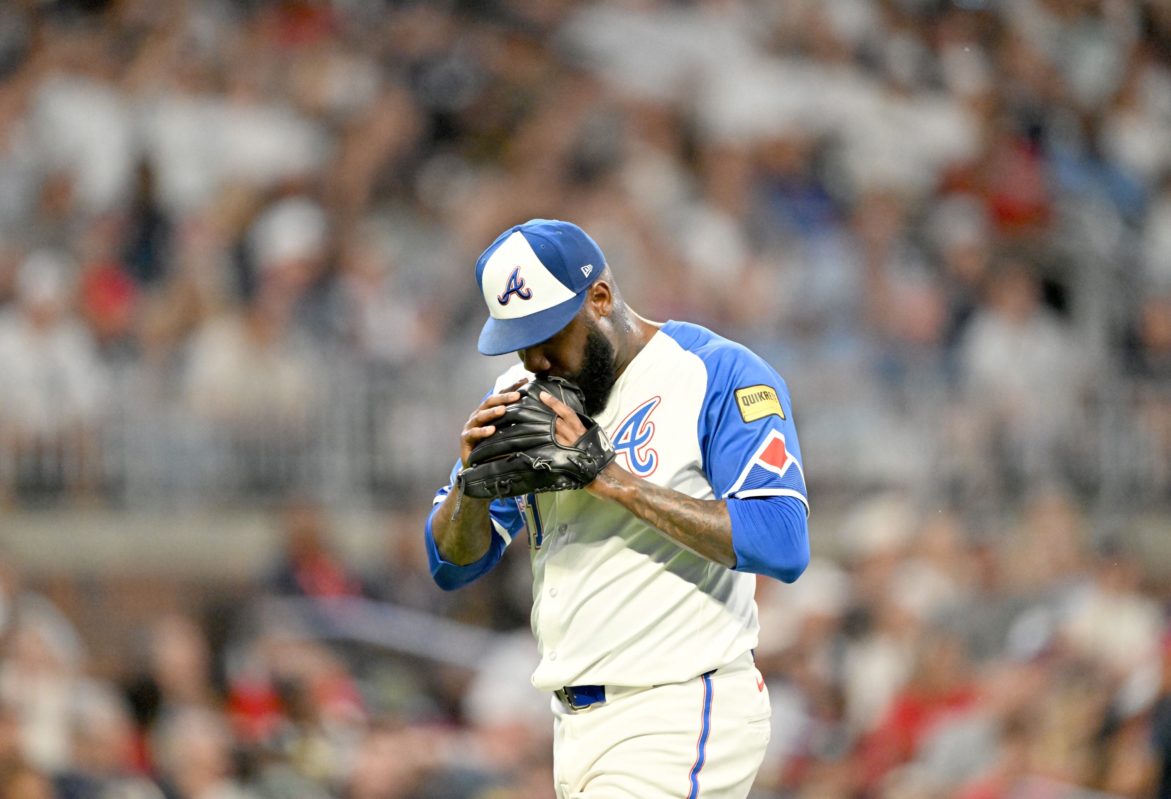 Atlanta Braves pitcher Enyel De Los Santos (61) is relieved during the sixth inning of a baseball game at Truist Park, Saturday, July 19, 2025, in Atlanta. New York Yankees won 12-9 over Atlanta Braves. (Hyosub Shin / AJC)