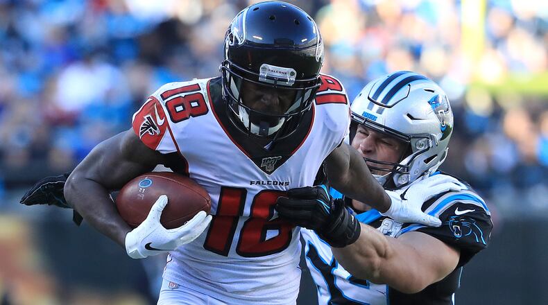 Carolina linebacker Luke Kuechly tackles Falcons wide receiver Calvin Ridley Sunday, Nov. 17. 2019, at Bank of America Stadium in Charlotte.