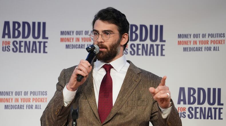 FILE - Hasan Piker speaks at a campaign rally for Abdul El-Sayed, a progressive candidate in the Democratic primary for U.S. Senate in Michigan, April 7, 2026, at the University of Michigan in Ann Arbor, Mich. (AP Photo/Julia Demaree Nikhinson, file)