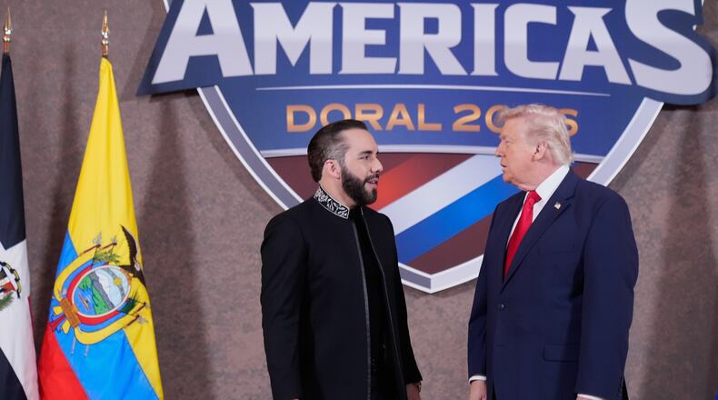 FILE - President Donald Trump greets El Salvador's President Nayib Bukele, left, at the Shield of the Americas Summit, March 7, 2026, at Trump National Doral Miami in Doral, Fla. (AP Photo/Mark Schiefelbein, File)