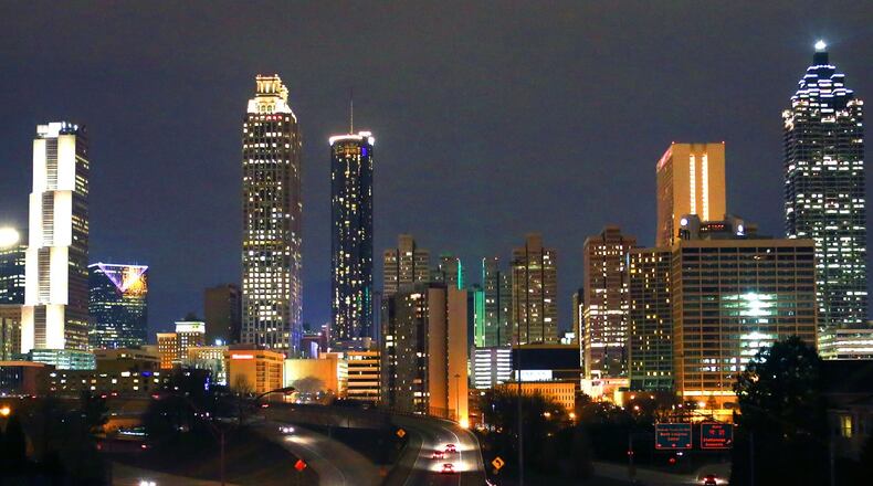 The Atlanta skyline shown from the Jackson Street bridge Thursday night, January 29, 2015. PHOTO / JASON GETZ