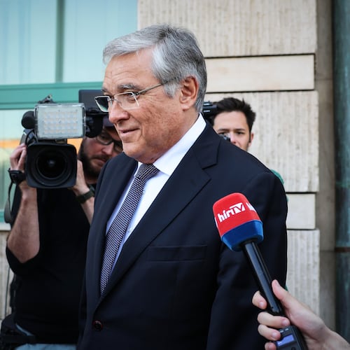 Russia's ambassador to Hungary, Evgeny Stanislavov, is surrounded by media as he leaves the Hungarian Foreign Ministry building after being summoned by Foreign Minister Anita Orban over a massive drone attack near Hungary's border with Ukraine, in Budapest, Thursday, May 14, 2026. (AP Photo)