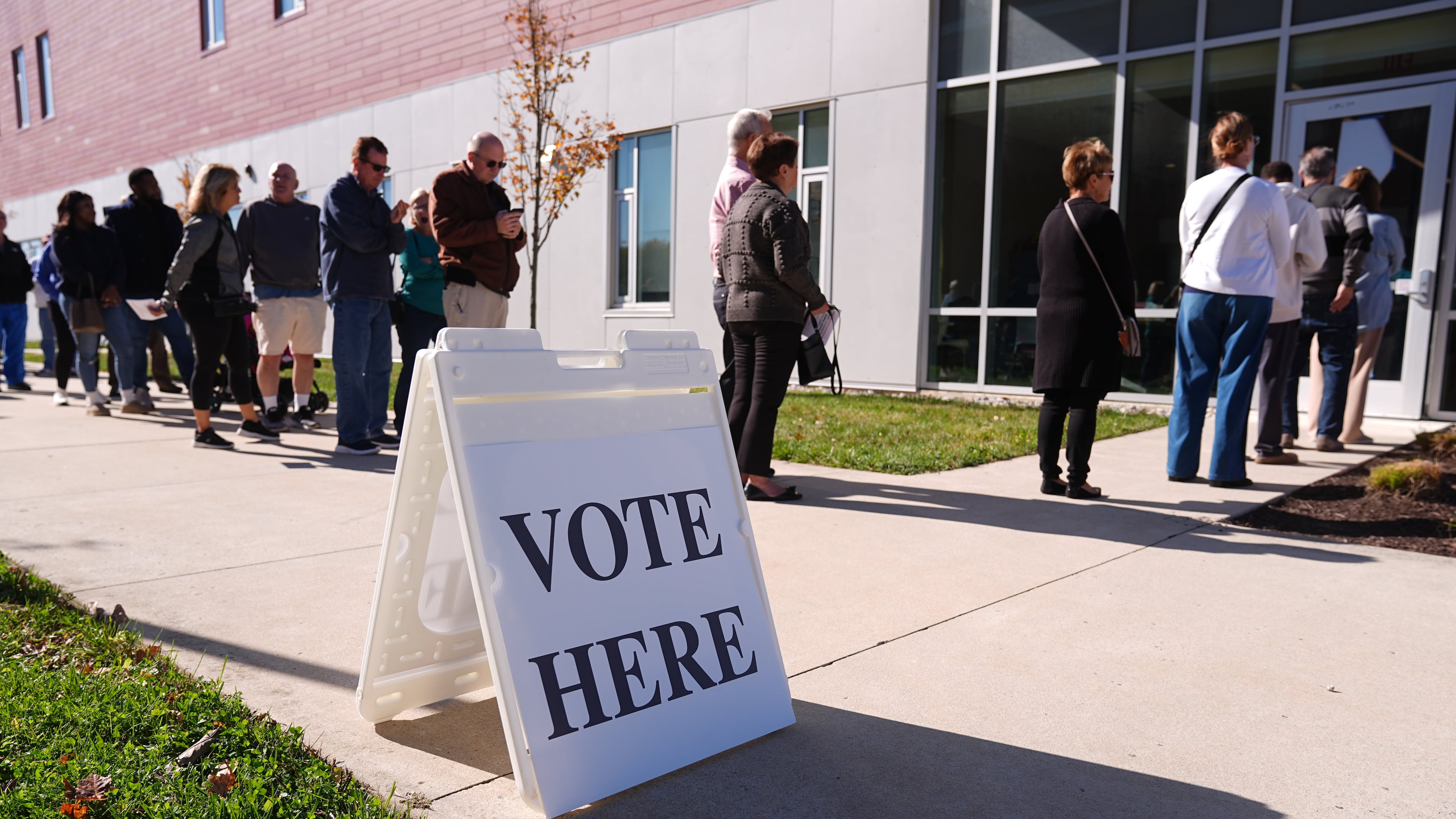 FILE - Voters wait in line to cast there ballot at a polling place at Rowan College in Mt Laurel, N.J., Oct. 27, 2025. (AP Photo/Matt Rourke, File)