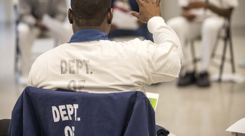 Self-proclaimed gang members participate in a Project Safe Neighborhood class, which assists in reform, at the Metro Reentry Facility, part of the Georgia Department of Corrections, near Atlanta on March 11, 2020. (Alyssa Pointer/Alyssa.Pointer@AJC.com)