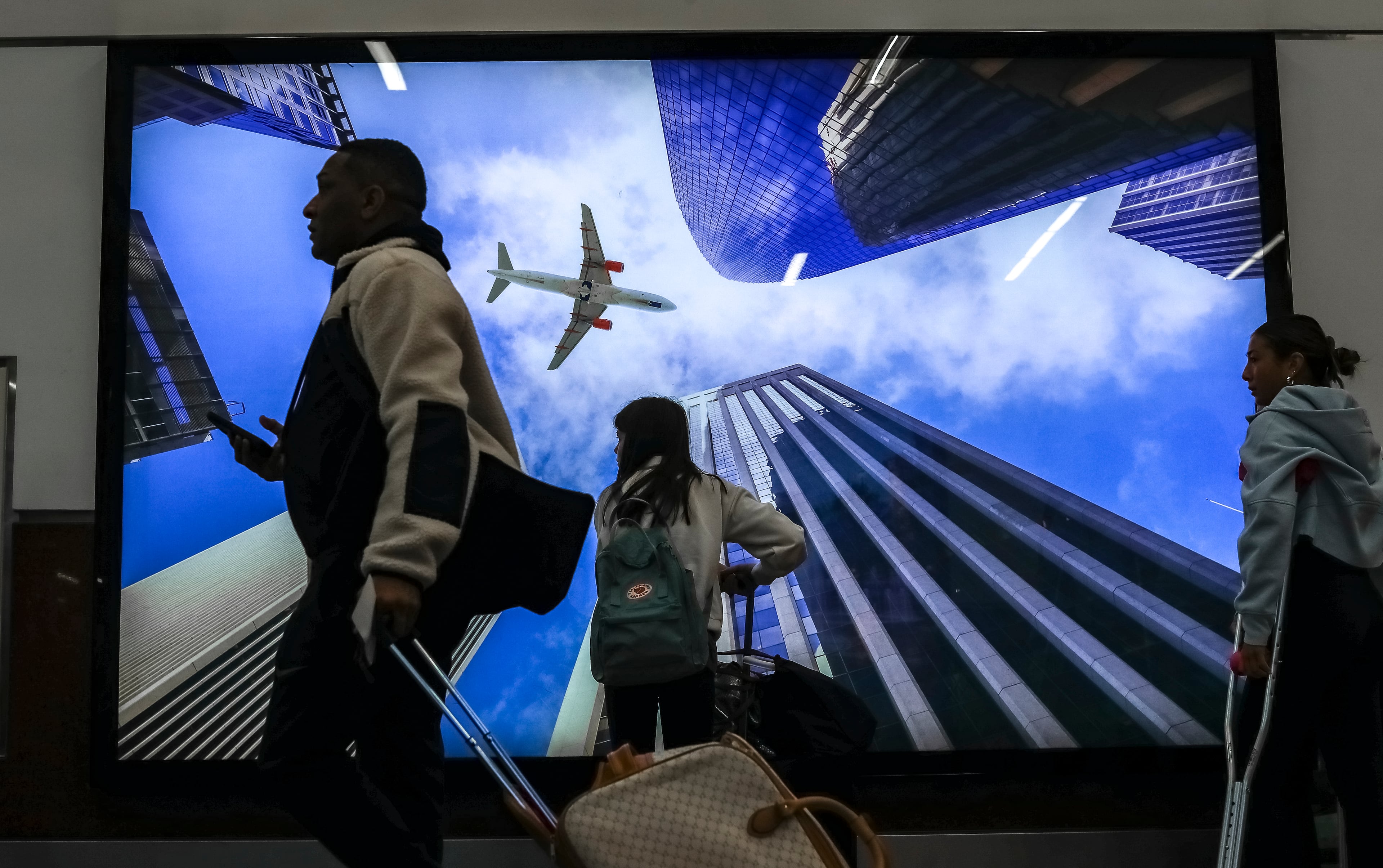 Air Travelers filled the airport Friday, Nov. 17, 2023 as the busy holiday period comes as the airport is in the midst of an array of construction projects. (John Spink / AJC file)