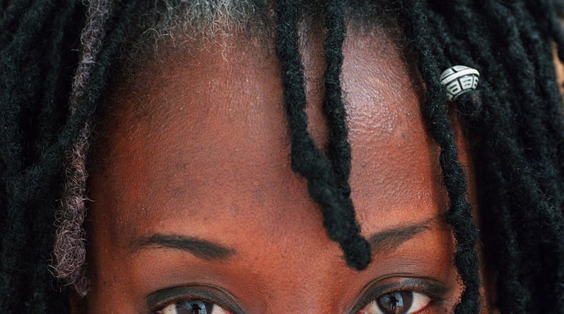 Parents are questioning school rules against braids, twists, cornrows and dreadlocks, traditional African-American hairstyles. (AJC File)
