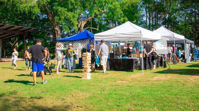 “Art on the Green” is one of many events held at the Elm Street Cultural Arts Village in downtown Woodstock. The City Council has approved spending $28,000 to have a consultant draw up bid documents to construct a playground there. ELM STREET CULTURAL ARTS VILLAGE via Facebook