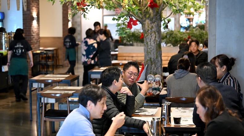 Korean diners enjoy their lunch at Dubu Gongbang, one of the newer Korean restaurants dedicated to tofu, in Duluth on Thursday, Dec. 5, 2024. Atlanta's Koreatown started along Buford Highway, extending from Duluth to northeast Atlanta and Suwanee. (Hyosub Shin/AJC)